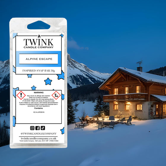 Alpine Escape inspired soy wax melt snap bar by Twink Candle Company, with a lit alpine chalet in snowy mountains