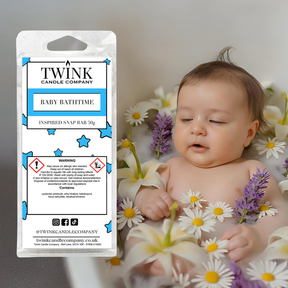 Baby Bathtime soy wax melt snap bar by Twink Candle Company, with a baby lying among fresh daisies