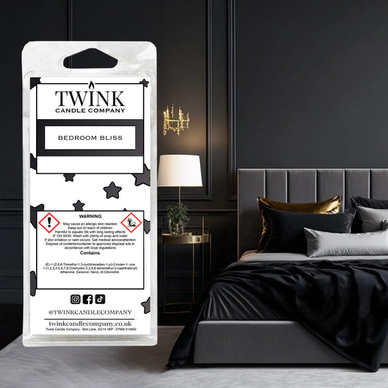 Bedroom Bliss inspired soy wax melt snap bar by Twink Candle Company, in a softly lit modern bedroom