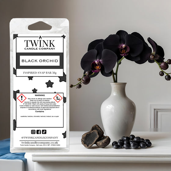 Black Orchid inspired soy wax melt snap bar by Twink Candle Company, with dark orchids in a white vase and black stones