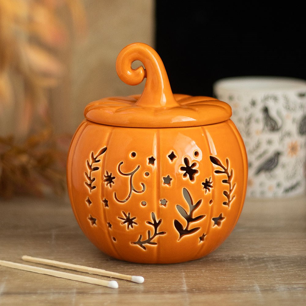 Orange folk pumpkin ceramic wax/oil burner by Twink Candle Company