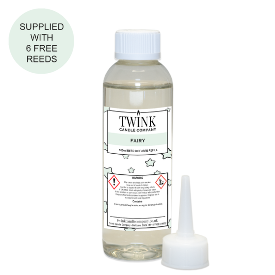 Fairy reed diffuser refill by Twink Candle Company, a 100ml bottle with pouring nozzle and six free reeds