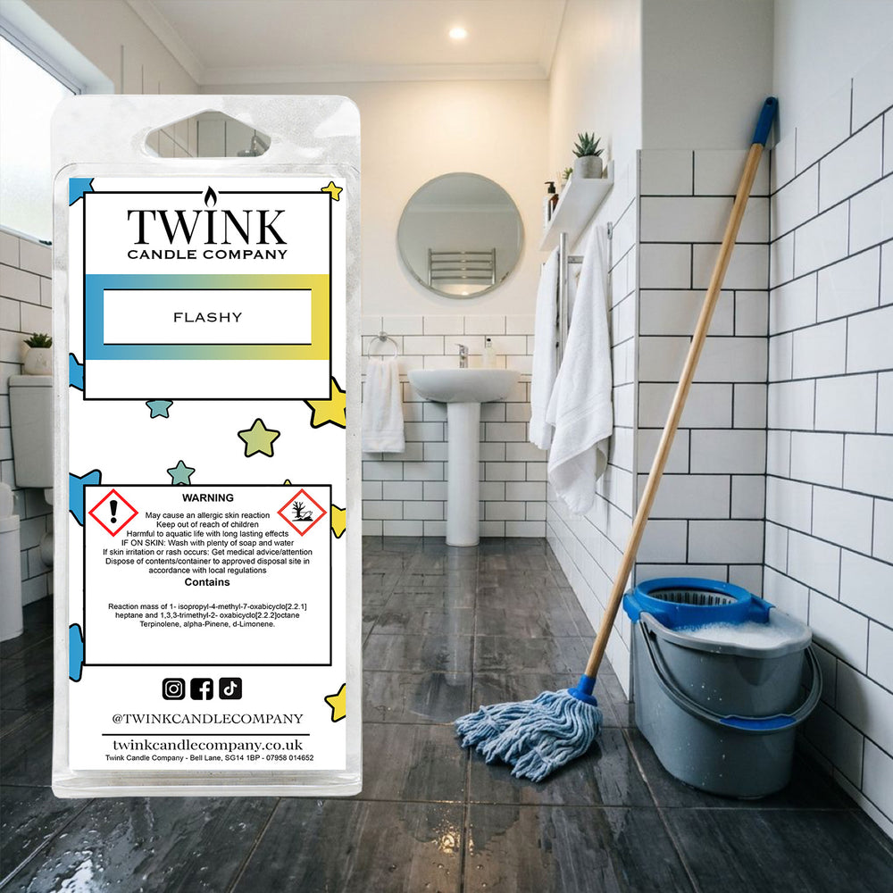Flashy inspired soy wax melt snap bar by Twink Candle Company, in a clean bathroom with a mop and bucket