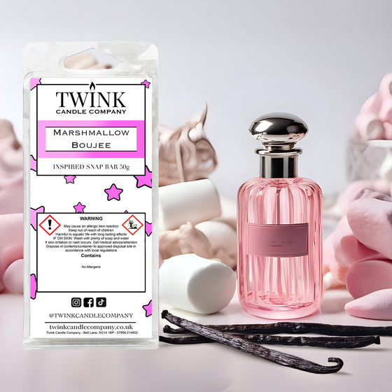 Marshmallow Boujee inspired soy wax melt snap bar by Twink Candle Company, with a pink perfume bottle and marshmallows