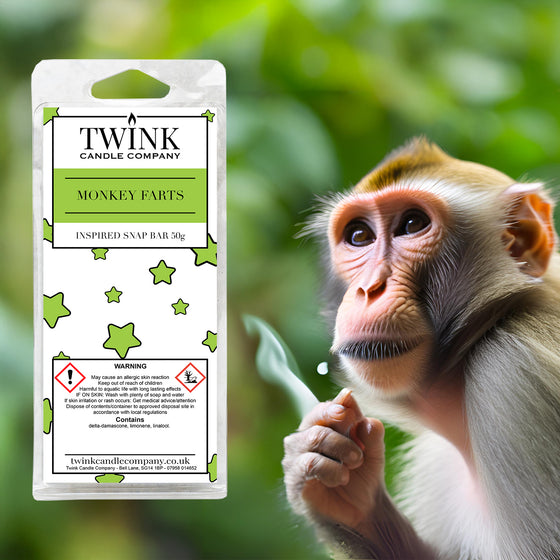 Monkey Farts soy wax melt snap bar by Twink Candle Company, with a monkey holding a leaf among green jungle foliage
