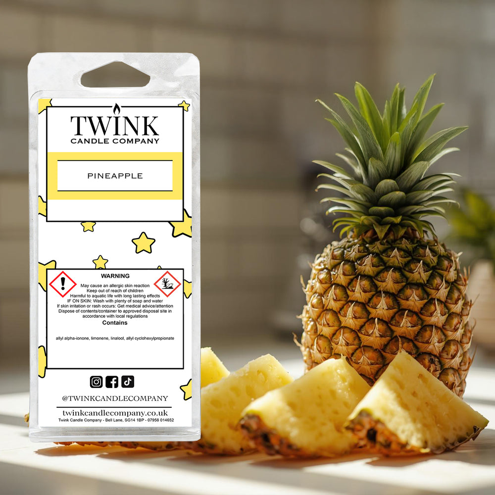 Pineapple inspired soy wax melt snap bar by Twink Candle Company, with a whole pineapple and fresh cut chunks