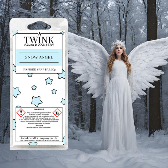 Snow Angel soy wax melt snap bar by Twink Candle Company, with an angel in a white gown and feathered wings in a snowy forest