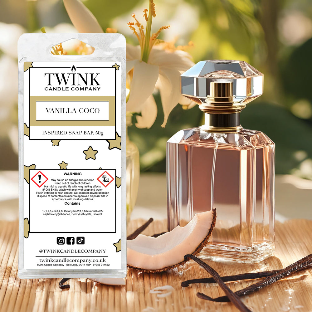 Vanilla Coco inspired soy wax melt snap bar by Twink Candle Company, with a perfume bottle, vanilla pods and flowers