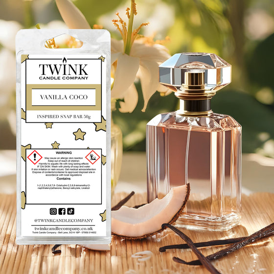 Vanilla Coco inspired soy wax melt snap bar by Twink Candle Company, with a perfume bottle, vanilla pods and flowers