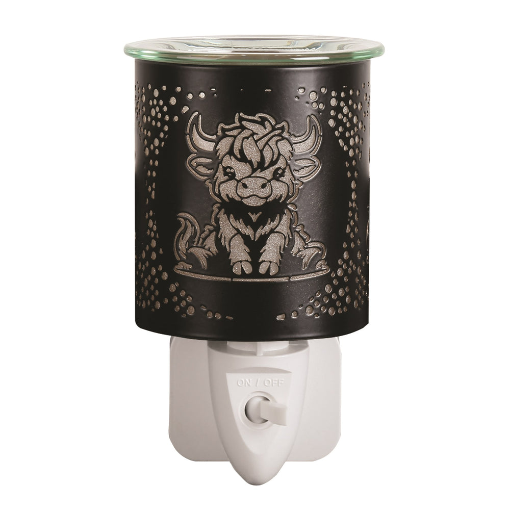 Black and gold Highland cow silhouette plug-in wax melt burner glowing on a white background