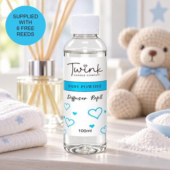 Baby Powder reed diffuser refill by Twink Candle Company, a 100ml bottle on a nursery shelf with soft white muslin and a knitted teddy
