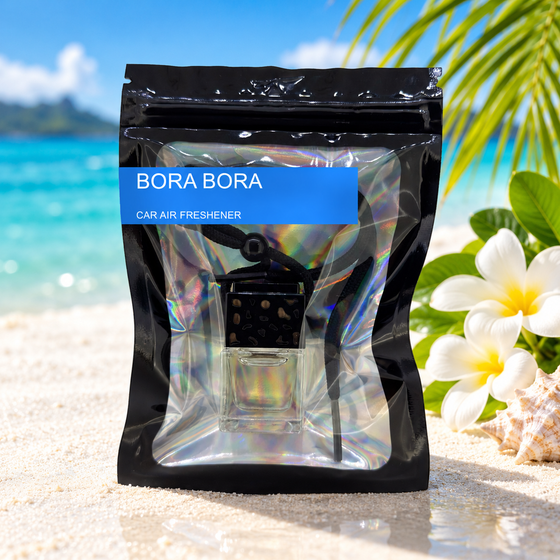 Bora Bora car air freshener by Twink Candle Company, hanging vent diffuser styled in a home setting