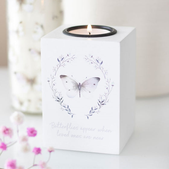Butterflies Appear t-light holder by Twink Candle Company, styled with pink blossom