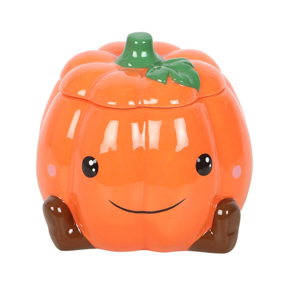 Cute smiling pumpkin wax/oil burner by Twink Candle Company — an orange ceramic pumpkin with a smiling face and star cut-outs