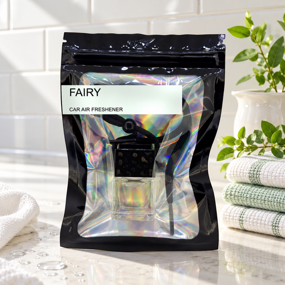 Fairy car air freshener by Twink Candle Company, hanging vent diffuser styled in a home setting