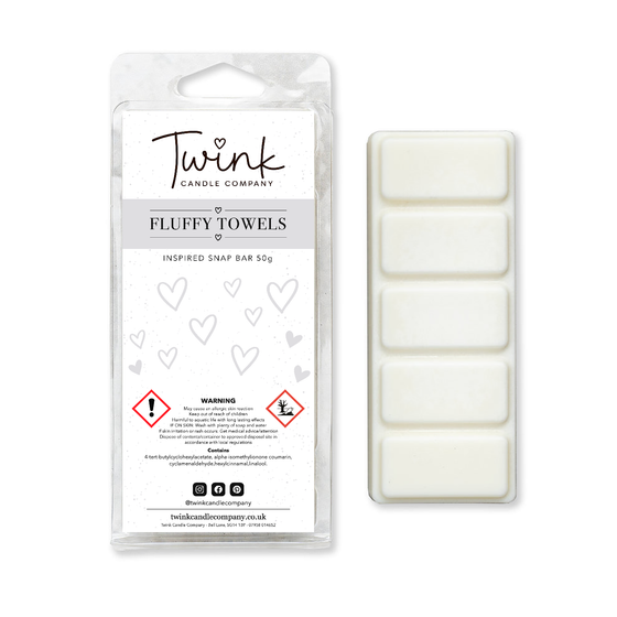 Fluffy Towels inspired soy wax melt snap bar with its five break-apart wax melts on a white background, by Twink Candle Company