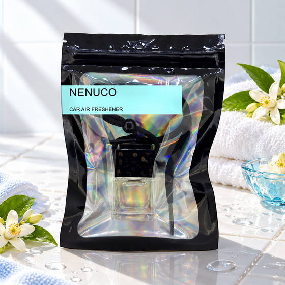 Nenuco car air freshener by Twink Candle Company, hanging vent diffuser styled in a home setting