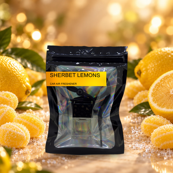 Sherbet Lemons car air freshener by Twink Candle Company, hanging vent diffuser styled in a home setting