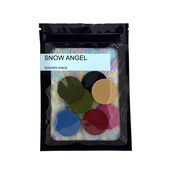Pack of 8 Snow Angel scented hoover discs in its sealed black foil packet on a plain white background