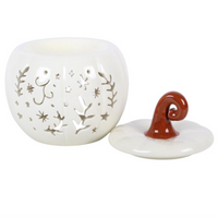 Cream folk pumpkin wax/oil burner by Twink Candle Company, lid removed showing the tealight recess and bowl