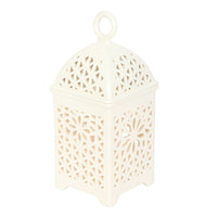 Lantern style wax and oil burner by Twink Candle Company, white ceramic with filigree cutouts and a hanging loop