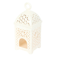 Lantern style wax and oil burner by Twink Candle Company, white ceramic lantern seen from another angle