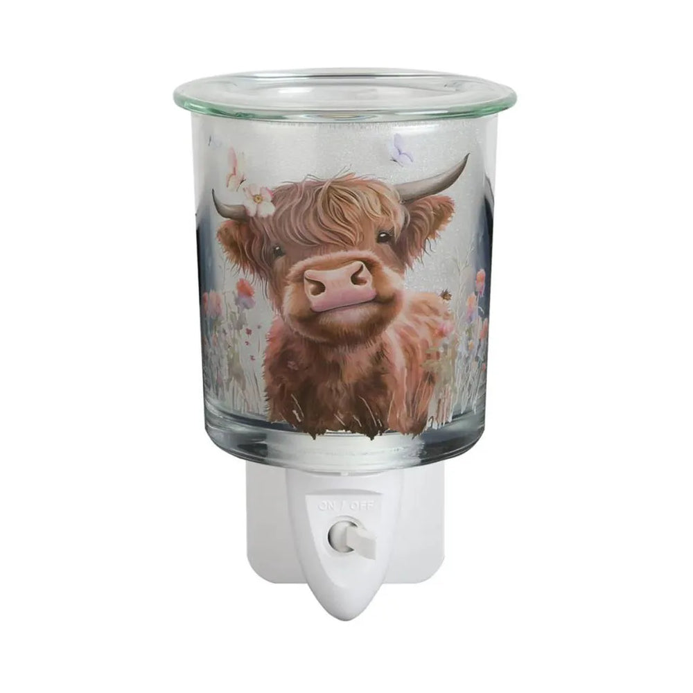 Watercolour Highland Cow plug-in wax melt burner with a highland cow and wildflowers design on a glass warmer