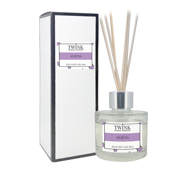 Aliens reed diffuser by Twink Candle Company, a 100ml glass bottle with reeds beside its gift box