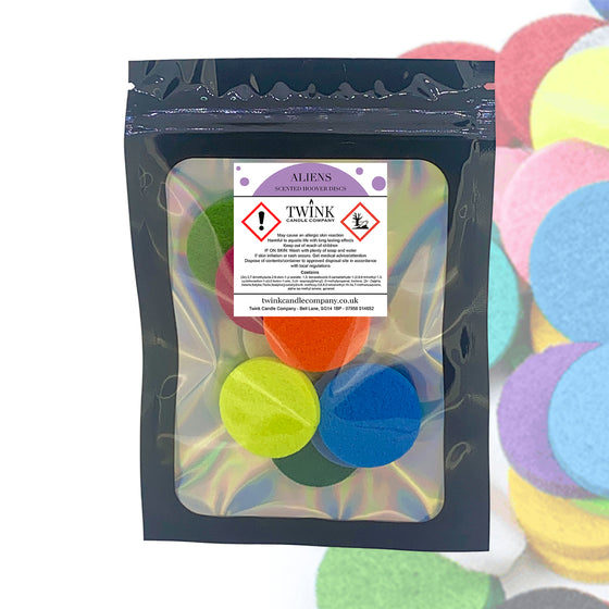 Aliens scented hoover discs by Twink Candle Company, a resealable pouch of 8 with pastel discs behind
