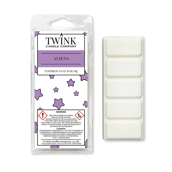 Aliens inspired 50g soy wax melt snap bar in its packet beside the unwrapped bar and its five break-apart segments