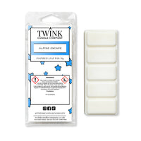 Alpine Escape inspired 50g soy wax melt snap bar in its packet beside the unwrapped bar and its five break-apart segments