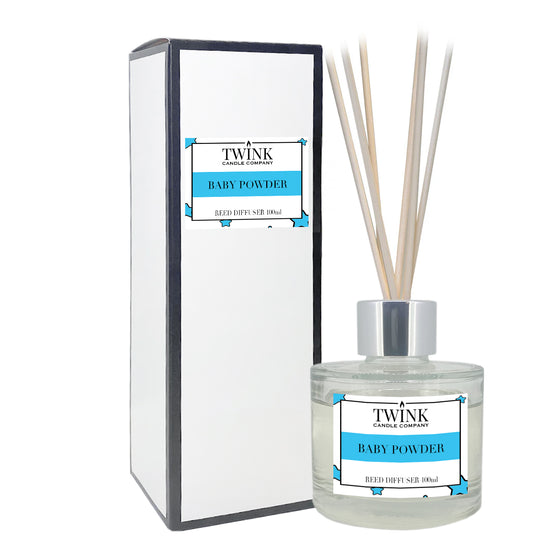 Baby Powder reed diffuser by Twink Candle Company, a 100ml glass bottle with reeds beside its gift box
