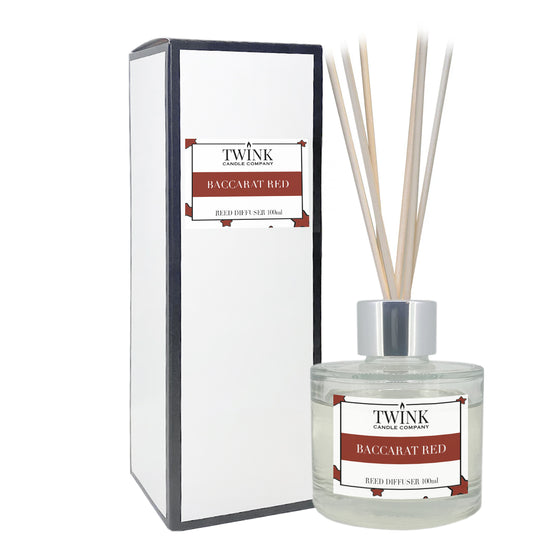 Baccarat Red reed diffuser by Twink Candle Company, a 100ml glass bottle with reeds beside its gift box