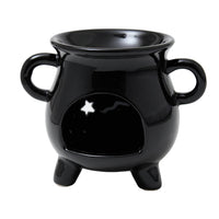 Rear of the black gloss star cauldron wax burner by Twink Candle Company, showing the tea light opening