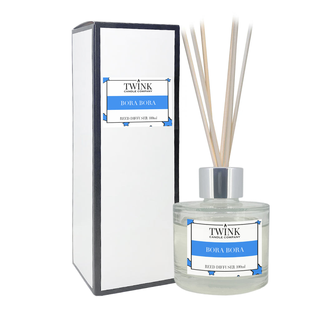 Bora Bora reed diffuser by Twink Candle Company, a 100ml glass bottle with reeds beside its gift box