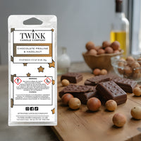 Chocolate Praline & Hazelnut soy wax melt snap bar by Twink Candle Company, with chocolate pieces and whole hazelnuts