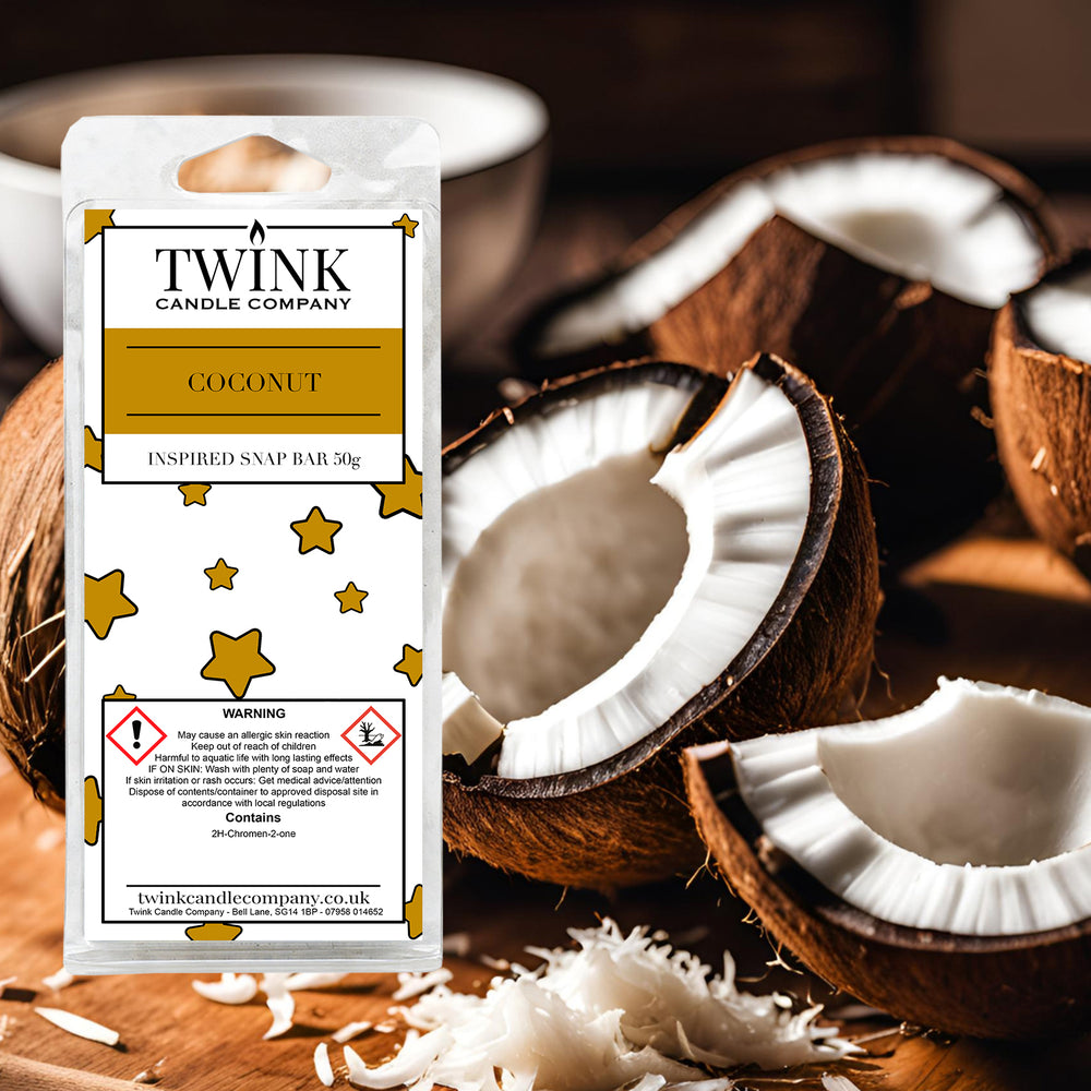 Coconut inspired soy wax melt snap bar by Twink Candle Company, with cracked coconut halves and fresh coconut flesh