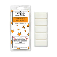 Cranberry Orange Spice 50g soy wax melt snap bar in its packet beside the unwrapped bar and its five break-apart segments