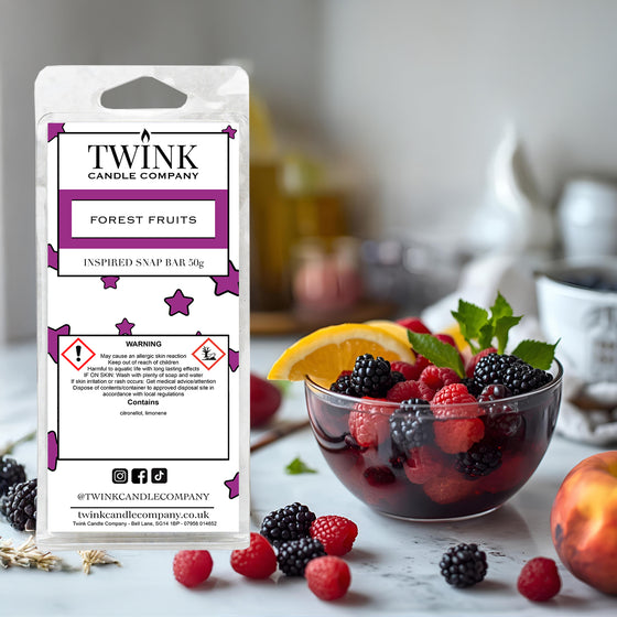 Forest Fruits soy wax melt snap bar by Twink Candle Company, with a glass bowl of blackberries, raspberries and peach