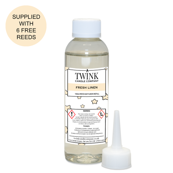 Fresh Linen reed diffuser refill by Twink Candle Company, a 100ml bottle with pouring nozzle and six free reeds