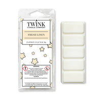 Fresh Linen inspired 50g soy wax melt snap bar in its packet beside the unwrapped bar and its five break-apart segments
