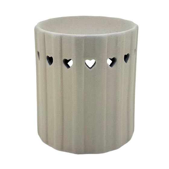 Heart cutout cream tumbler wax and oil burner by Twink Candle Company, a ceramic tea light burner