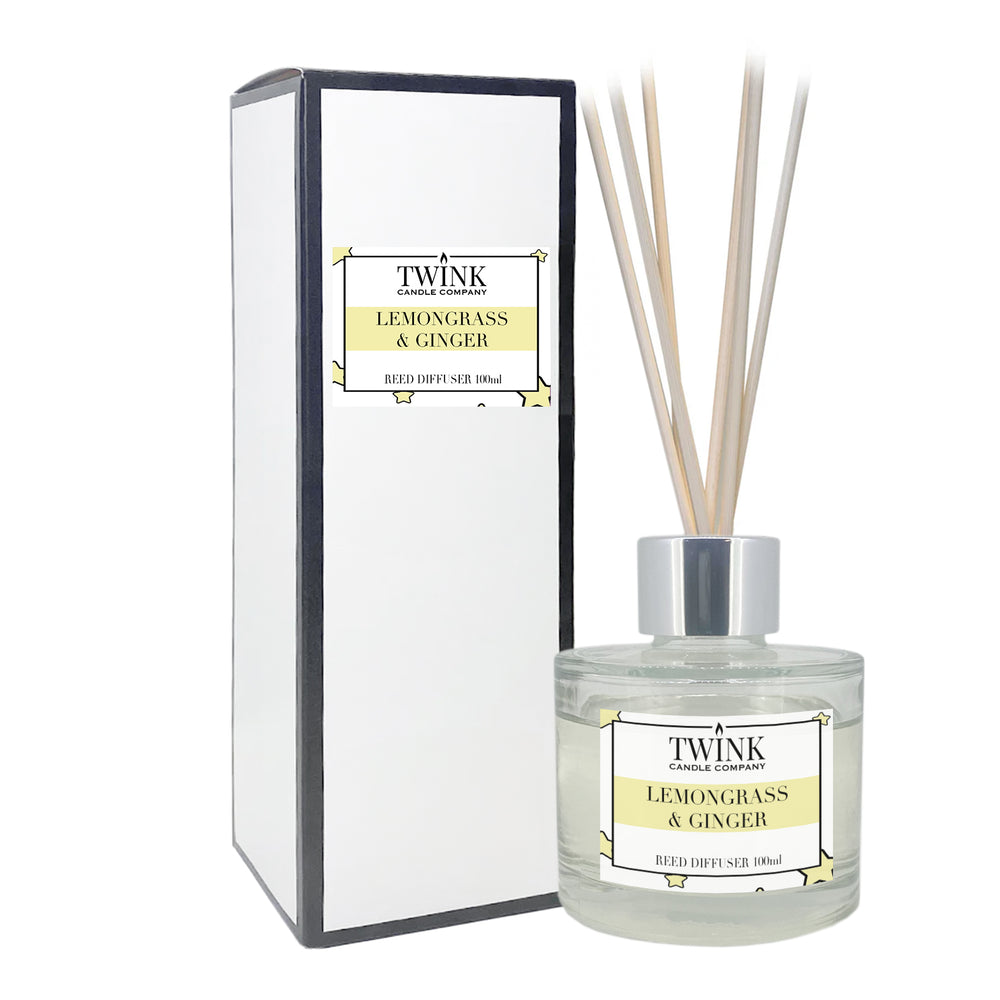 Lemongrass & Ginger reed diffuser by Twink Candle Company, a 100ml glass bottle with reeds beside its gift box