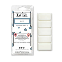 Luna inspired 50g soy wax melt snap bar in its packet beside the unwrapped bar and its five break-apart segments