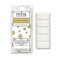 Luscious Vanilla 50g soy wax melt snap bar in its packet beside the unwrapped bar and its five break-apart segments