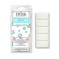 Nenuco 50g soy wax melt snap bar in its packet beside the unwrapped bar and its five break-apart segments