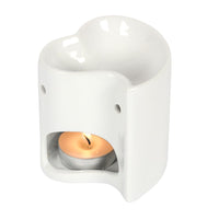 Mini heart wax and oil burner by Twink Candle Company, shown with a tea light in place