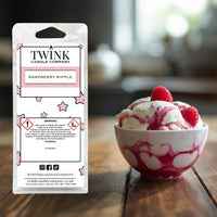 Raspberry Ripple inspired soy wax melt snap bar by Twink Candle Company, beside a bowl of raspberry ripple ice cream