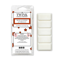 Rich Leather & Tobacco inspired 50g soy wax melt snap bar in its packet beside the unwrapped bar and its five segments