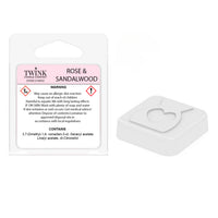 Back of the Rose & Sandalwood inspired snap bar packet showing contents and safety information, with a heart-shaped wax sample